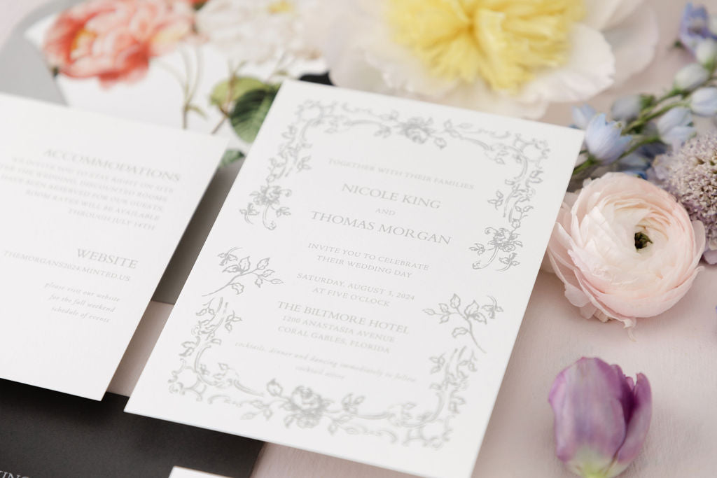 vintage style wedding invitation with a classic design, gray ink and ornate frame